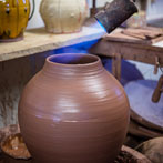 Doug Fitch and Hannah McAndrew making a jug for me